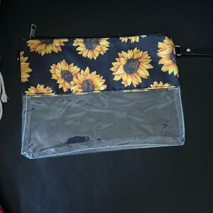 sunflower canvas and clear stadium bag can be used as a wristlet or Crossbody